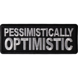 May include: Black embroidered patch with white text that reads "Pessimistically Optimistic".