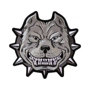 May include: A gray embroidered patch of a snarling pit bull dog with a spiked collar. The patch is on a white background.