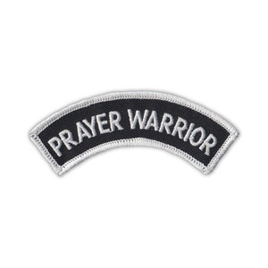 May include: Black and white embroidered patch with the text "PRAYER WARRIOR" in a curved shape.