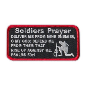May include: A black and white embroidered patch with red stitching. The patch features a soldier kneeling in prayer with a rifle and the text "Soldiers Prayer DELIVER ME FROM MINE ENEMIES O MY GOD: DEFEND ME FROM THEM THAT RISE UP AGAINST ME. PSALMS 59:1"