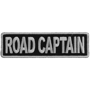 May include: Black embroidered patch with white text that reads "ROAD CAPTAIN".