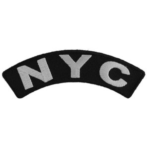 May include: Black fabric patch with a white embroidered 'NYC' in an arched shape.