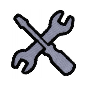 May include: A gray wrench and screwdriver crossed over each other. The tools are outlined in black.