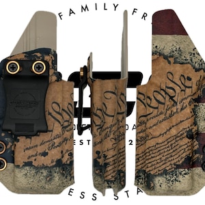 May include: A set of three gun holsters with a patriotic design. The holsters feature a distressed American flag pattern with the text "We the People" and other script. The holsters are in shades of blue, red, and tan.