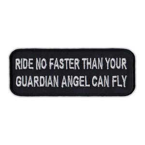May include: Black embroidered patch with white text that reads "Ride No Faster Than Your Guardian Angel Can Fly."