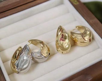Aros gruesos de oro bicolor de 18 quilates: joyas modernas y llamativas
