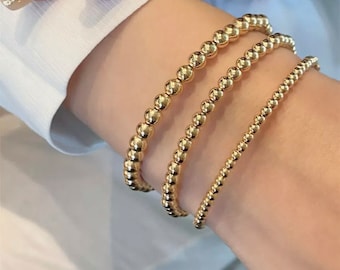 18k gouden kralenarmband - elastische elastische kralenarmband - perfect om te stapelen met andere armbanden, horloges - niet gevuld, niet verguld