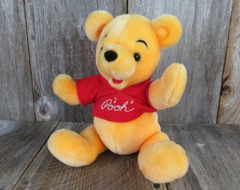 Vintage Winnie the Pooh Plush Musical Jointed Stuffed Animal Disney Store Yellow Red Shirt