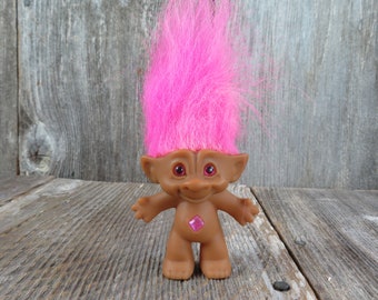 trolls with diamond belly buttons