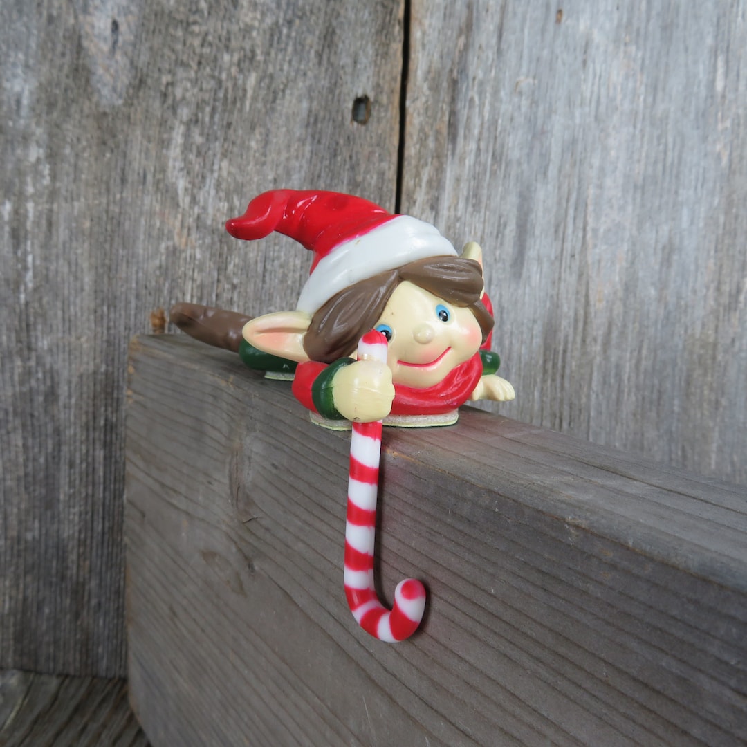 Vintage Elf Stocking Holder Christmas Laying Helper Candy Cane Hanger