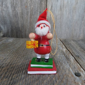 Vintage Santa Holding Yellow Gift Wooden Ornament Standing On Books Wood Christmas Felt Pipe Cleaners
