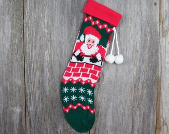Vintage Santa Claus in Chimney Stocking Knit Christmas Pom Poms Red Green White 1980s