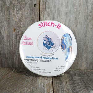 May include: Stitch-it embroidery kit featuring a pair of blue sneakers. The kit includes everything needed to complete the project, including printed fabric, acrylic yarn, an embroidery needle, and easy instructions. The kit also includes a frame.