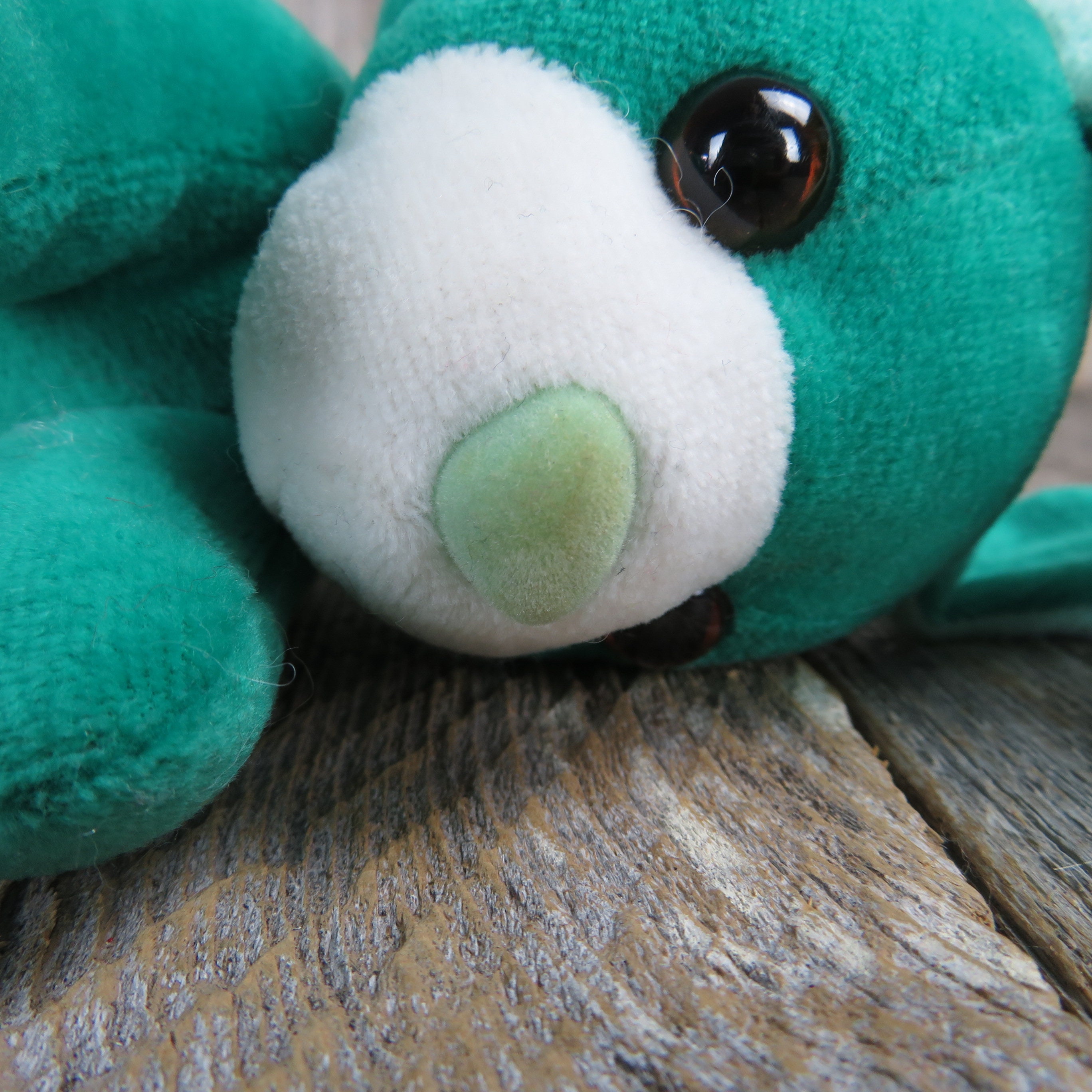 Green dog plush deals