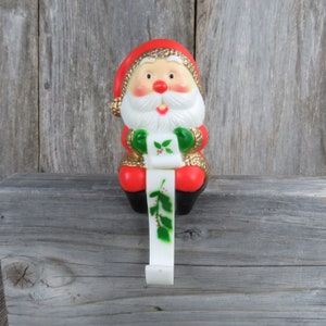 Vintage Santa Claus with List Stocking Holder Christmas Wreath Bow Santa Hat Hanger Hook Future 1985