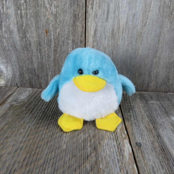 stuffed blue penguin