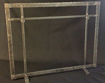 Craftsman mission style forged fireplace screen.