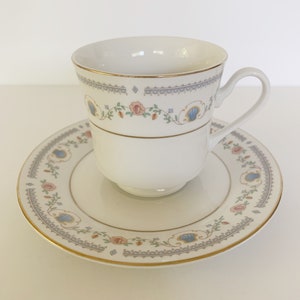 Footed teacup and saucer set Tivoli by Sango - collectible vintage ceramic