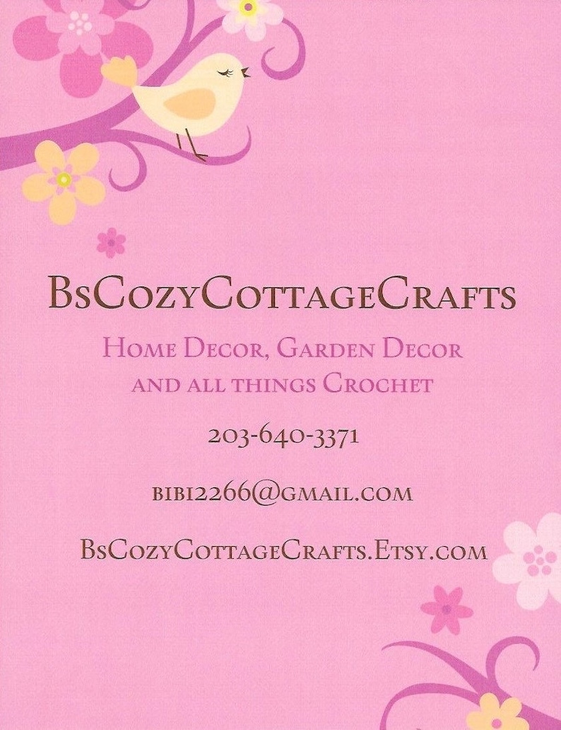 May include: A pink business card with a white bird on a branch with pink and yellow flowers. The text on the card reads "BsCozyCottageCrafts", "Home Decor, Garden Decor", "And All Things Crochet", "203-640-3371", "BIBI2266@GMAIL.COM", and "BsCozyCottageCrafts.Etsy.com".