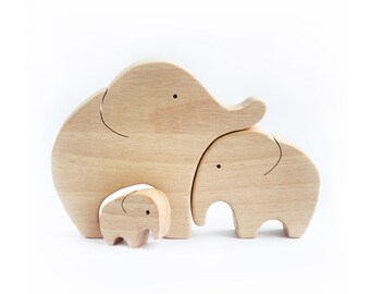 Wooden elephant puzzle nursery decor . First time mom wooden animals family . Expecting parents gift