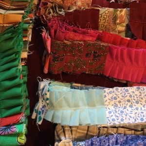 Handmade fabric ruffles/ junk journal belly band.