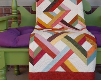 Sunset quilt pattern is vibrant and full of movement and color possibilities!