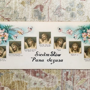 May include: A vintage religious card with seven images of Jesus Christ on the cross. Each image is surrounded by a floral border and has a caption in Polish. The card is titled "Siedem Slow Pana Jezusa" which translates to "Seven Words of Our Lord Jesus".