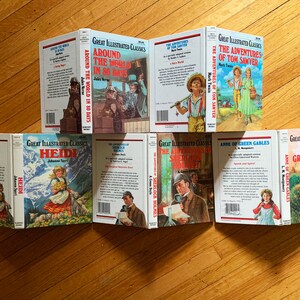 May include: A collection of eight classic children's books with colorful covers featuring illustrations of characters from the stories. The titles include "Around the World in 80 Days", "The Adventures of Tom Sawyer", "Heidi", "Anne of Green Gables", and "The Adventures of Sherlock Holmes".
