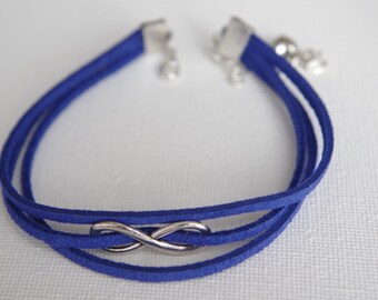 Blue Suede Infinity Bracelet: Silver Plated Toggle Clasp