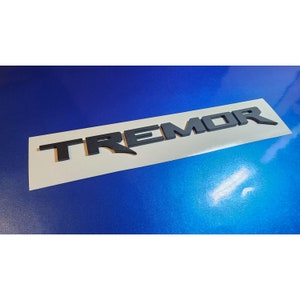 Tremor Inverted Tailgate Badge Replacement