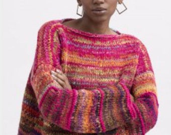 May include: A colorful striped sweater with a loose fit and long sleeves. The sweater is made of a soft, fuzzy yarn and has a relaxed, casual style.