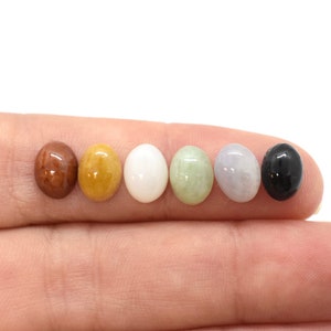 A jewelry maker will use 24 jade beads deals and 30 teak beads