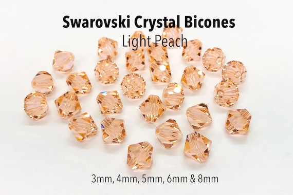 Swarovski 5301 4mm Bicone Beads - Crystal (36)