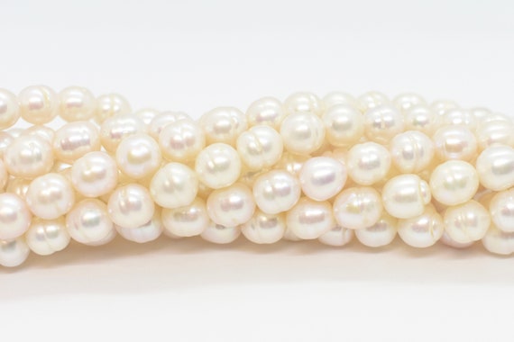 White Almost Round Freshwater Pearl Beads With Ridges Wholesale