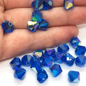 Cuentas bicono de cristal checo Preciosa AB Capri Blue, 3 mm, 24 unidades, azul oscuro, auténticas cuentas de cristal Preciosa compatibles con Swarovski 5301/5328