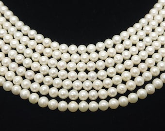 Vente en gros perles de pomme de terre d'eau douce blanc ivoire presque rondes - Blanc, qualité A, presque rond - 6 mm (65 perles/fil)