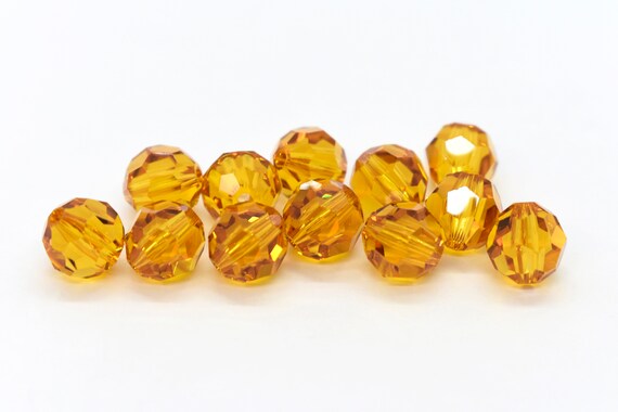 Topaz 5000, Swarovski Crystal Round Amber Orange Beads 5mm Orange 