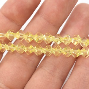 Jonquil 5310 - Pale Yellow Swarovski Crystal Faceted Simplicity Beads 5.5mm Wholesale Crystal beads for Jewelry, Bulk Crystal Beads