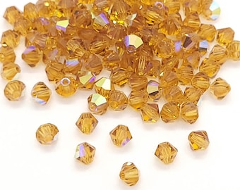 Topaz AB Preciosa Perles toupies en cristal tchèque, toupies 4 mm, 24 pièces, authentique Preciosa compatible avec le cristal Swarovski 5301/5328