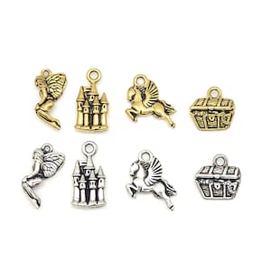 May include: A set of eight gold and silver charms featuring a castle, a unicorn, a chest, and a fairy. The charms are perfect for jewelry making or scrapbooking.