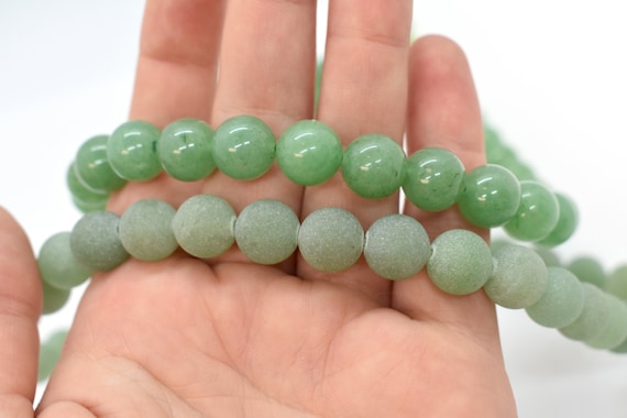 Cordón De Piedras Preciosas De ágata Con Bandas En La Oscuridad | Foto Premium