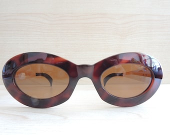 Gafas de sol vintage VERSACE 425 Medusa fabricadas en Italia, nuevas sin usar.