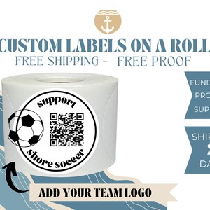 May include: A roll of white custom labels with a soccer ball and QR code design. The label says "Support Shore Soccer". The text "Custom Labels on a Roll" is at the top of the image. The text "Free Shipping - Free Proof" is below the label roll. The text "Add Your Team Logo" is at the bottom of the image.