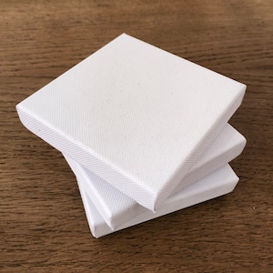 Boîte cadeau blanche idéale pour des bijoux ou de petits objets