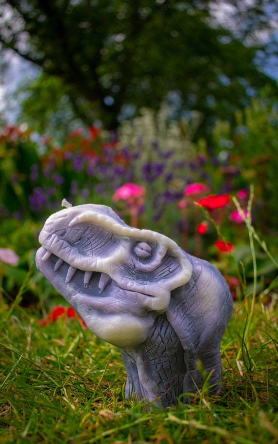 T-Rex head candle from Holyrood Candles on Etsy