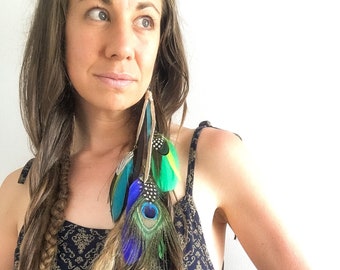 Tropical feather earring with vivid blues and jungle greens, also doubles up as a hair clip / peacock / festival / burning man