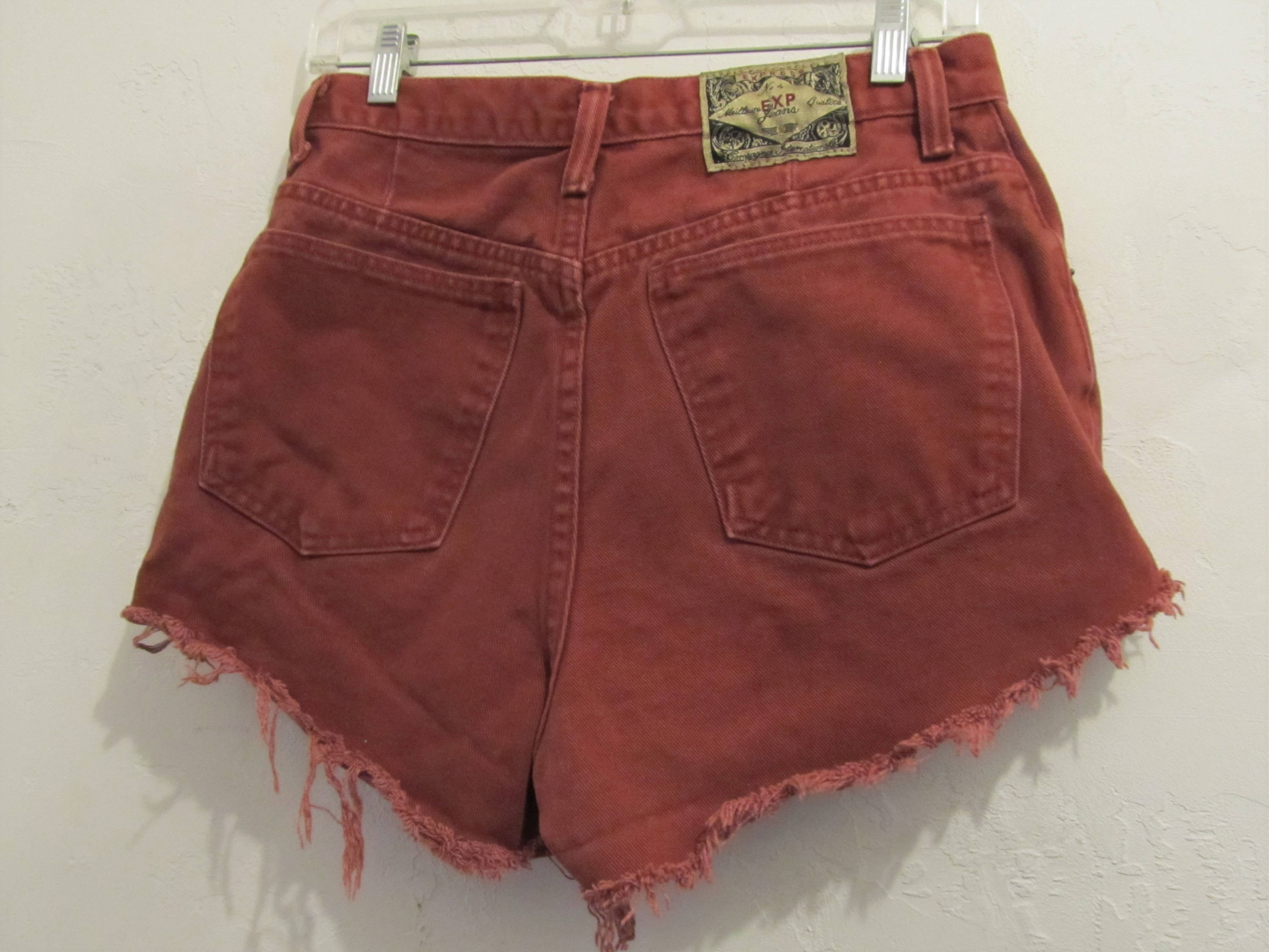 red cut off shorts