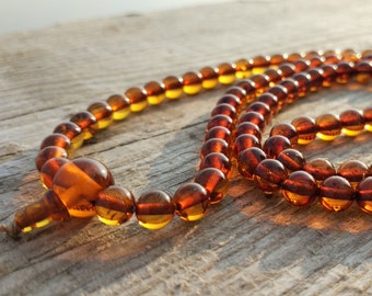 A little bigger 108 baltic amber mala for meditation for meditation (size Ø6,5 colour 4)