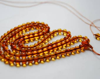 Warmth - 108 beads baltic amber mala for meditation (size Ø7 colour 4), buddhist meditation, guru bead, 108 bead mala