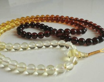 FULL OF LIFE: 108 beads baltic amber mala  (size Ø7  rainbow)